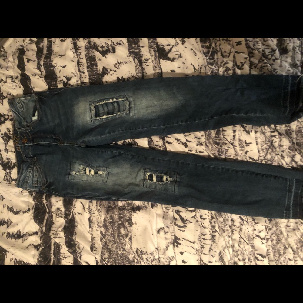 Dark blue ripped jeans